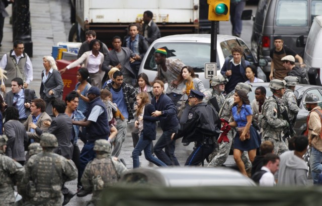 150399-actor-brad-pitt-c-runs-during-the-filming-of-zombie-movie-world-war-z-