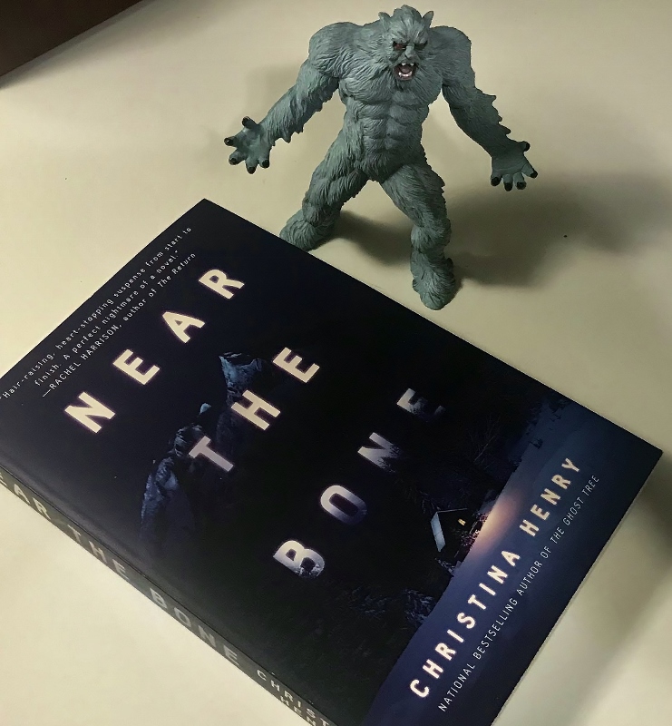 Christina Henry book "Near the Bone" with monster figure